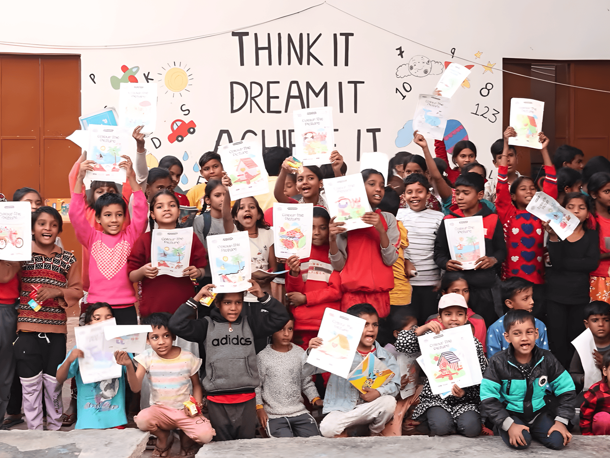 Children proudly holding certificates